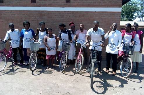TWESA members outside the office after a "keep Karonga Clean" Campaign