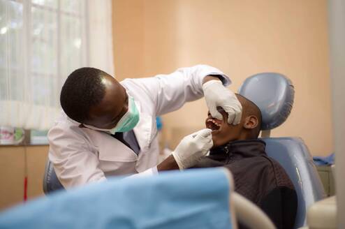 A dentist doing a dental check-up during Go-Elective Dental Internship in Kenya