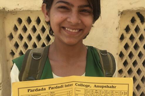 Student with perfect grade card