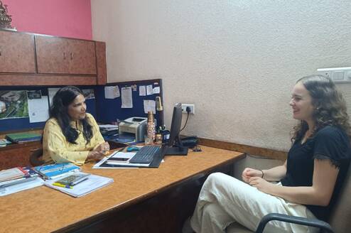 Intern discussing with supervisor in India