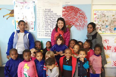 Volunteer with children in South Africa