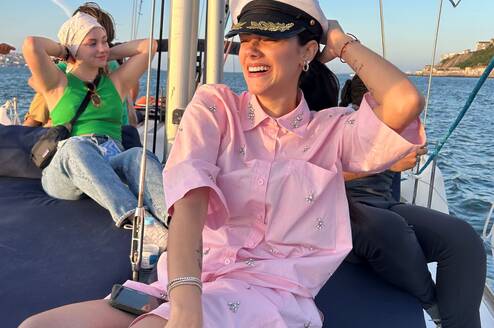 Students enjoying themselves on a sailboat in Lisbon, Portugal