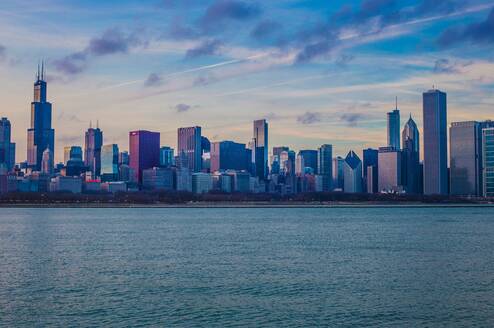 A body of water and the skyline of a city