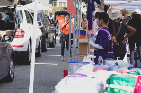 Volunteers distribute vital supplies