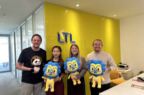 Students at LTL Beijing with Lex the Lion