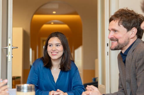 MA student having a class with a professor