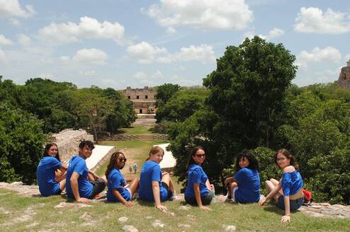 Students looking over ruins in Merida