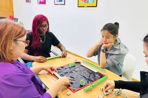 JADE Ambassadors Learning How To Play Majong