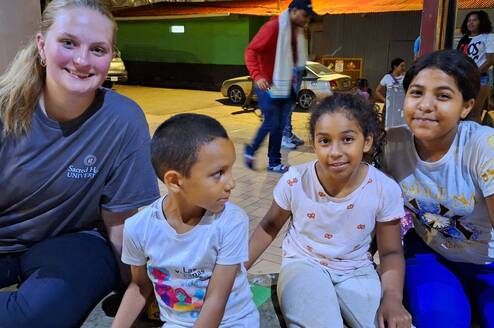 Volunteer with local children 