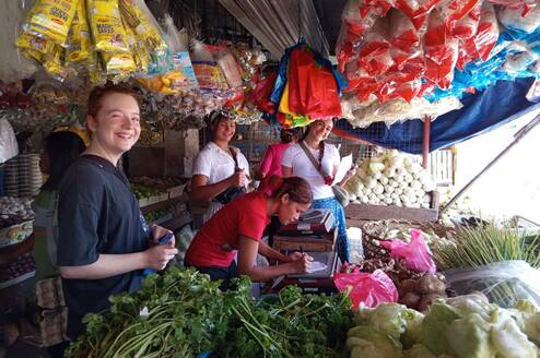 Volunteers purchasing ingredients at the public market