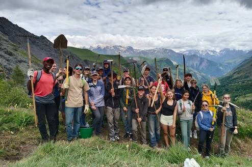 Student group in French Alps doing community service