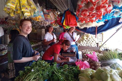 Volunteers purchasing ingredients at the public market