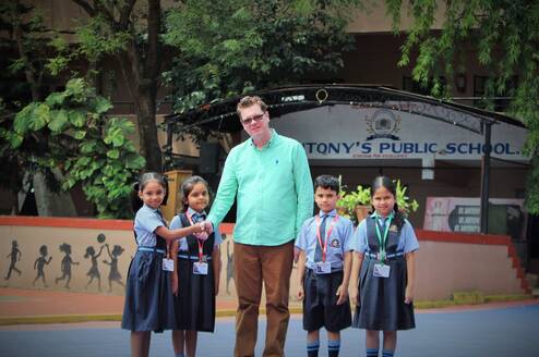 4 young students meeting international Teacher 