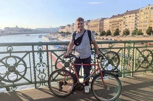 Ben on bike by Danube