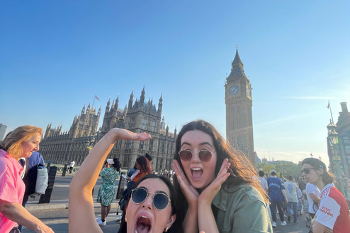 Two women in front of Big Ben in London