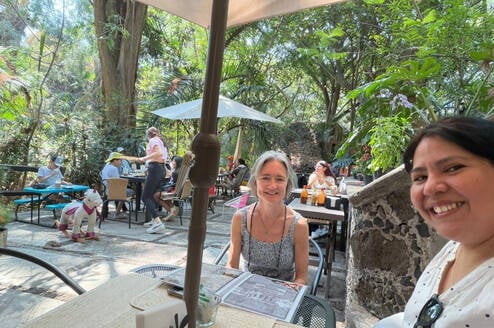 American Spanish immersion student in a cafe in Cuernavaca with her Spanish teacher