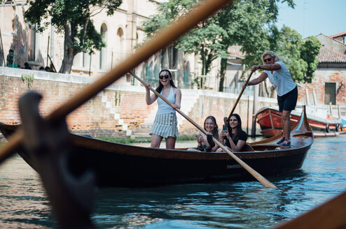 Rowing a gondola in Venice