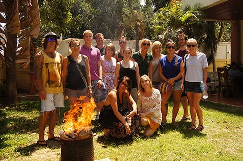 Group of myTEFL interns smiling together.