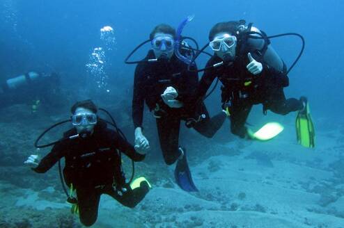 group having fun diving in Costa Rica