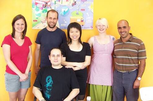 group of locals and interns in Spain