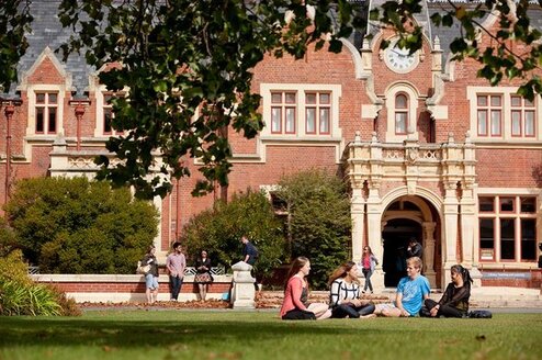Study Abroad at Lincoln University in Christchurch, NZ students sitting on lawn