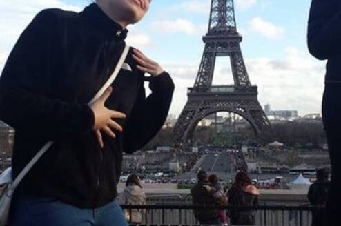 Student from IBS Winter One posing contently by the Eiffel Tower in Paris!
