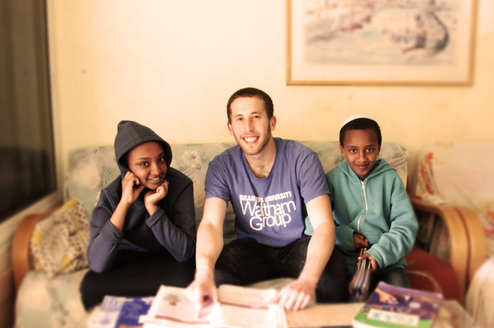 Yahel - Israel volunteer with Ethiopian-Israeli host family & students in Rishon