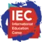 A blue and red logo for IEC. International Education Camp