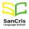Logo de SanCris Language School: Libro abierto verde con hojas.