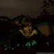 Natália with bioluminescent mushrooms