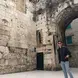 Student in front of historical building