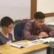Teacher working with student