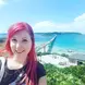 woman standing in front of ocean