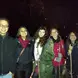 a group of students, bundled up, posing together 