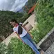 girl standing outdoors, looking into the distance