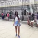 Kagiso J. in front of building