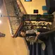 Eryn Lin smiling sitting on a staircase