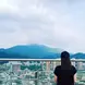 Shannon facing a mountain in South Korea