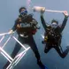 Helen Wu diving with a diving buddy