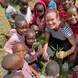 Amanda Drobek smiling with children 