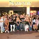 Mickey with friends posing for a photo