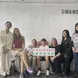 Clara and friends pose with XMandarin sign