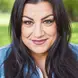 Gina poses for a professional headshot