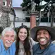 Three people smiling at the camera