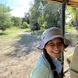 On a safari in Tanzania through the GIVE program with a giraffe in the background