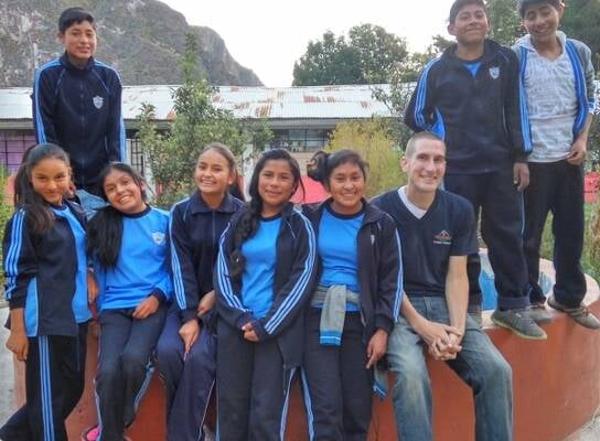 Volunteer Greg with his students