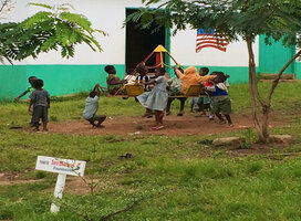 children in Ghana playing on playground