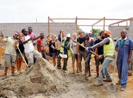 Volunteers on the Rising Education Centre site