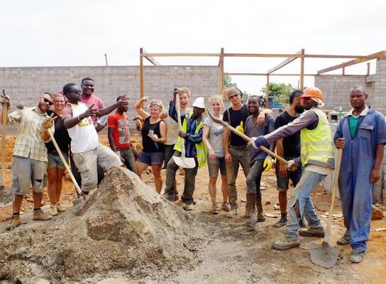 Volunteers on the Rising Education Centre site
