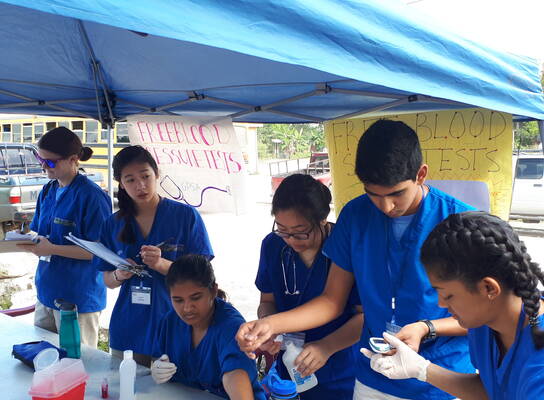 GPSA team during a health fair in Beliez